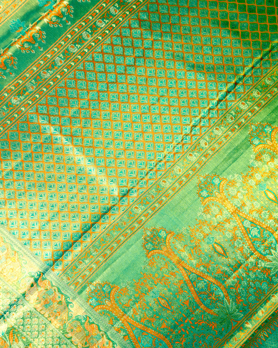 Saffron Pure Kanjivaram Saree with Floral Vine Jaal Weaves with Contrast Border