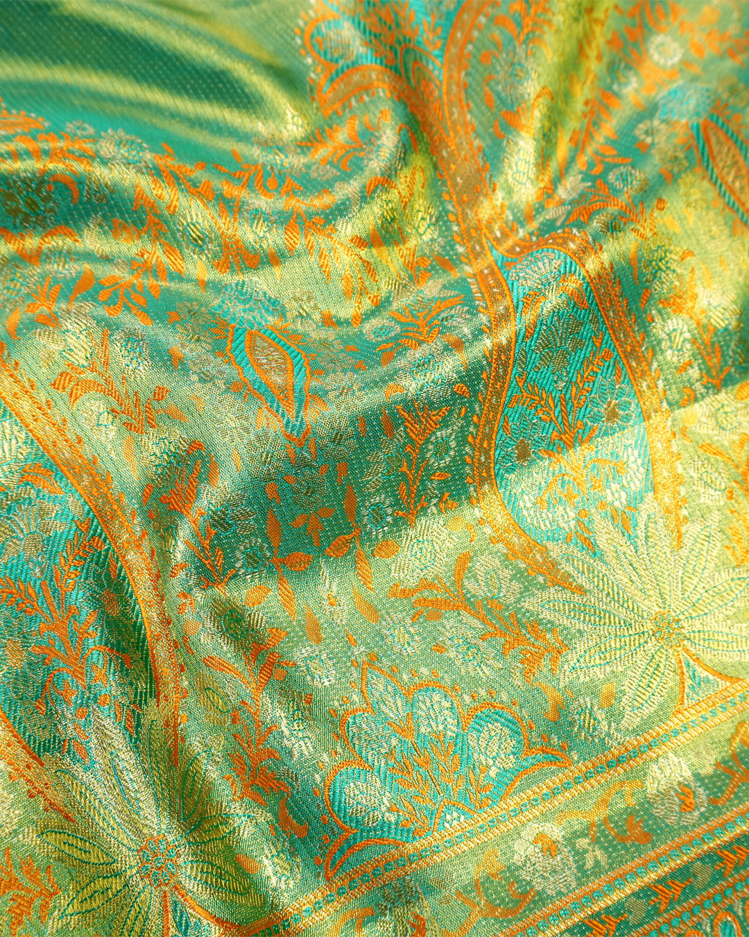 Saffron Pure Kanjivaram Saree with Floral Vine Jaal Weaves with Contrast Border