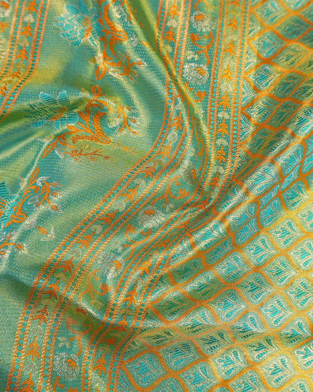 Saffron Pure Kanjivaram Saree with Floral Vine Jaal Weaves with Contrast Border