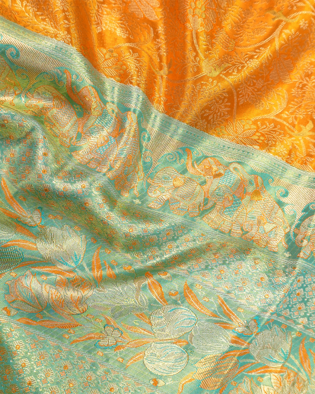 Saffron Pure Kanjivaram Saree with Floral Vine Jaal Weaves with Contrast Border