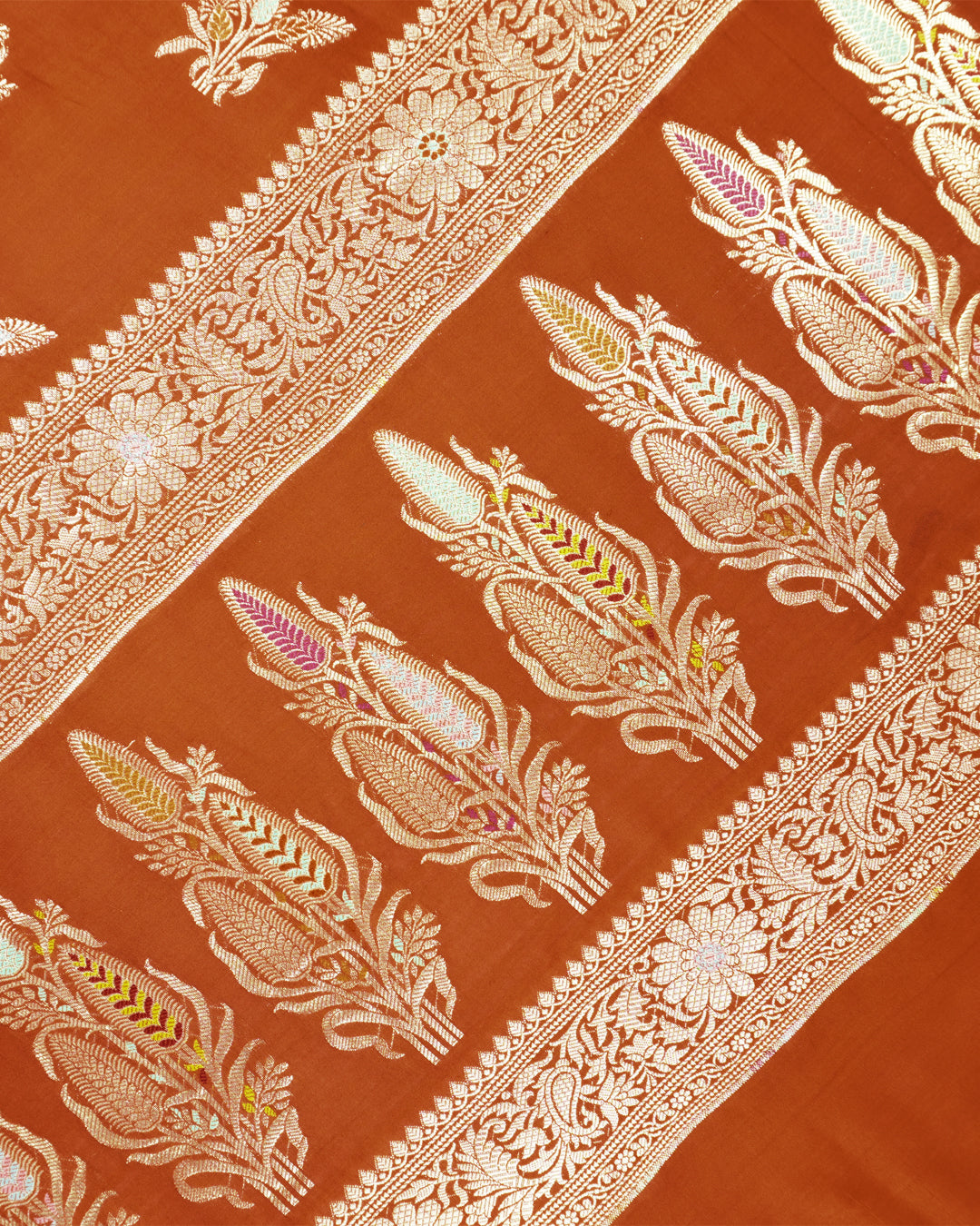 Terracotta Pure Banarasi Saree with Graceful Floral Butidar Weaves