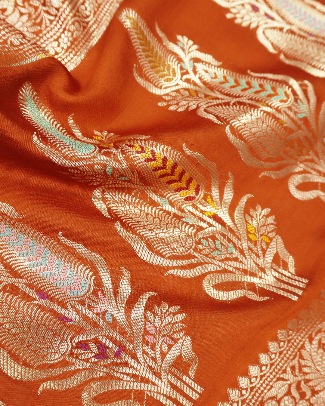 Terracotta Pure Banarasi Saree with Graceful Floral Butidar Weaves