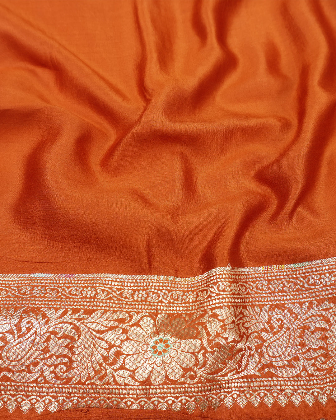 Terracotta Pure Banarasi Saree with Graceful Floral Butidar Weaves