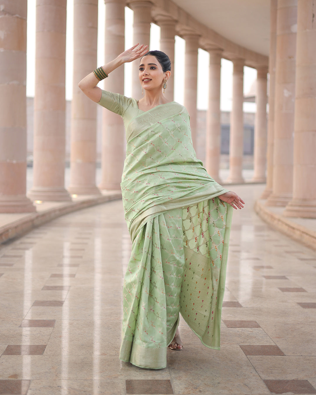 Olive Grace Light Green Pure Banarasi Silk Saree with Ornate Designs