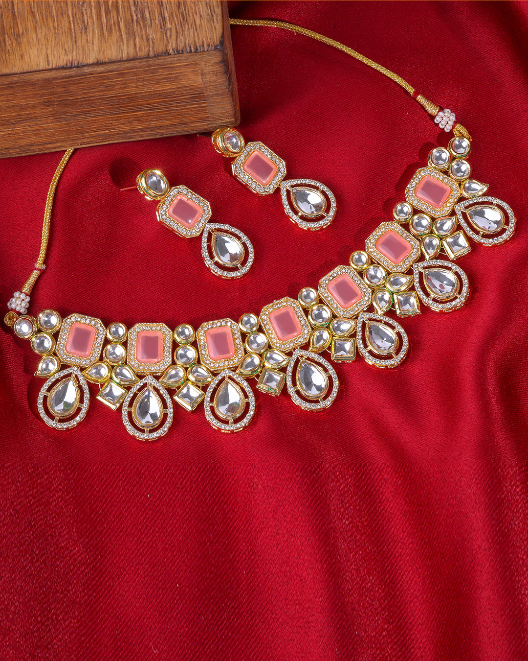 Peach Tone Kundan Studded Necklace Set