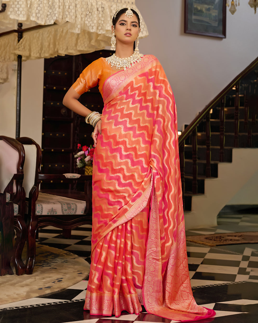 Sunset Flame Pure Chiffon Saree with Handwoven Rangkat Patterns