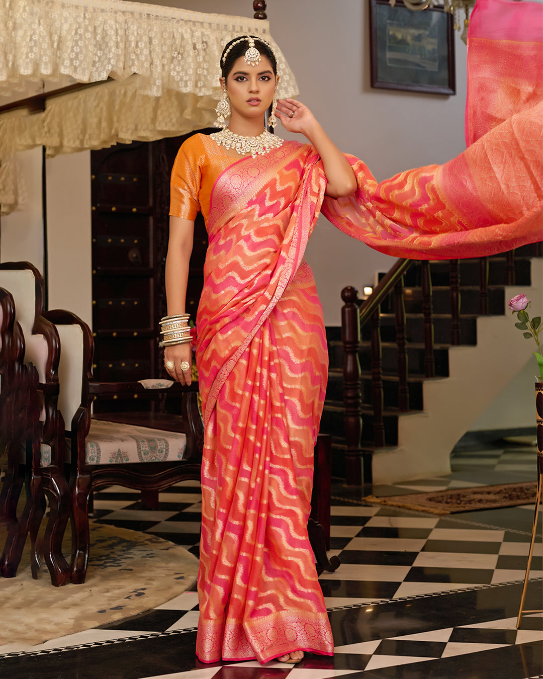 Sunset Flame Pure Chiffon Saree with Handwoven Rangkat Patterns