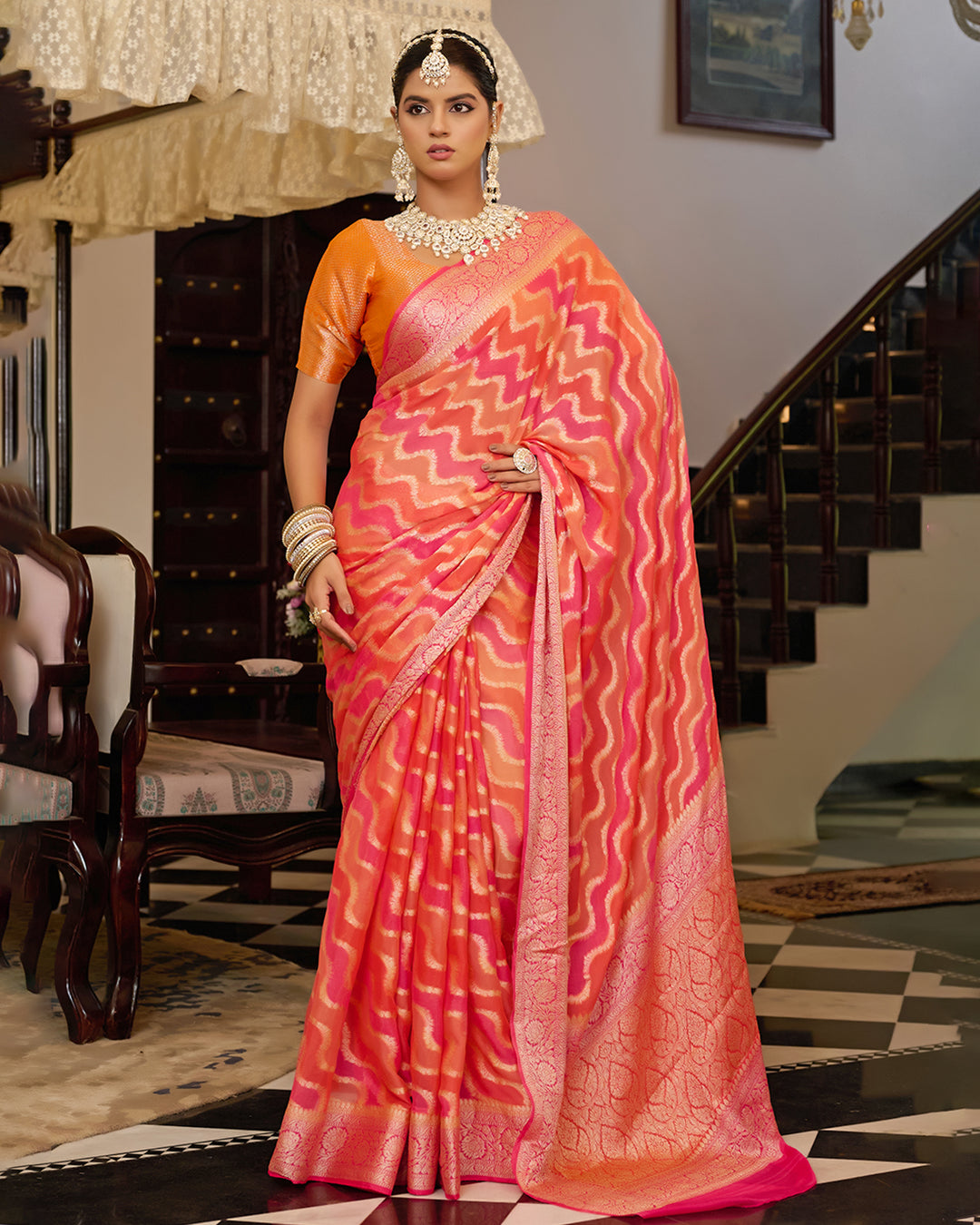 Sunset Flame Pure Chiffon Saree with Handwoven Rangkat Patterns