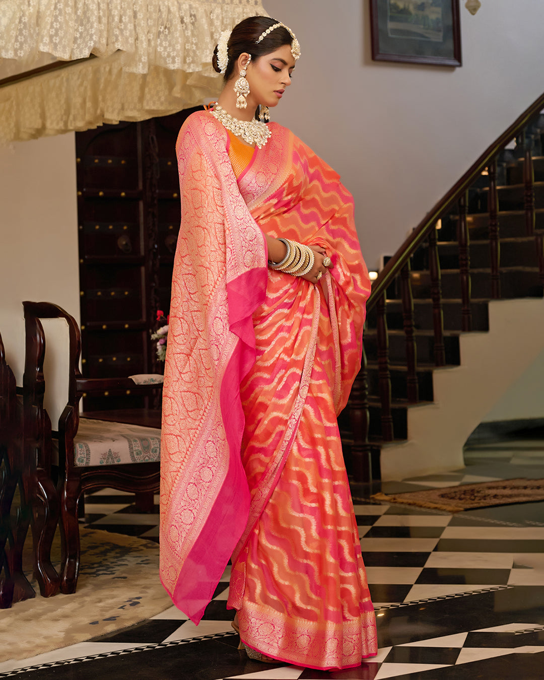 Sunset Flame Pure Chiffon Saree with Handwoven Rangkat Patterns