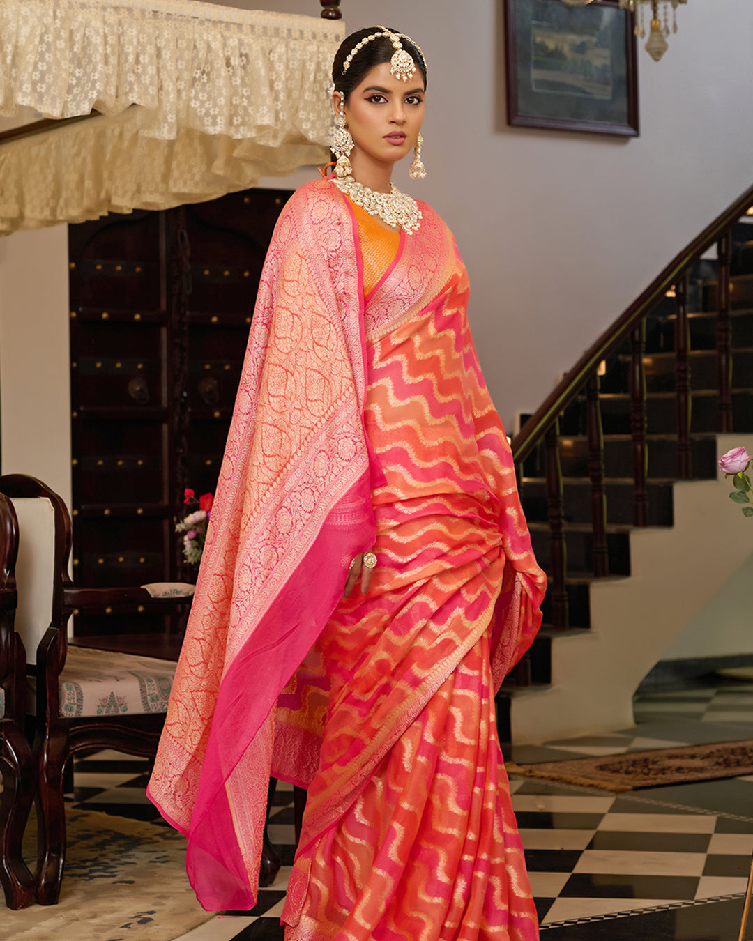 Sunset Flame Pure Chiffon Saree with Handwoven Rangkat Patterns