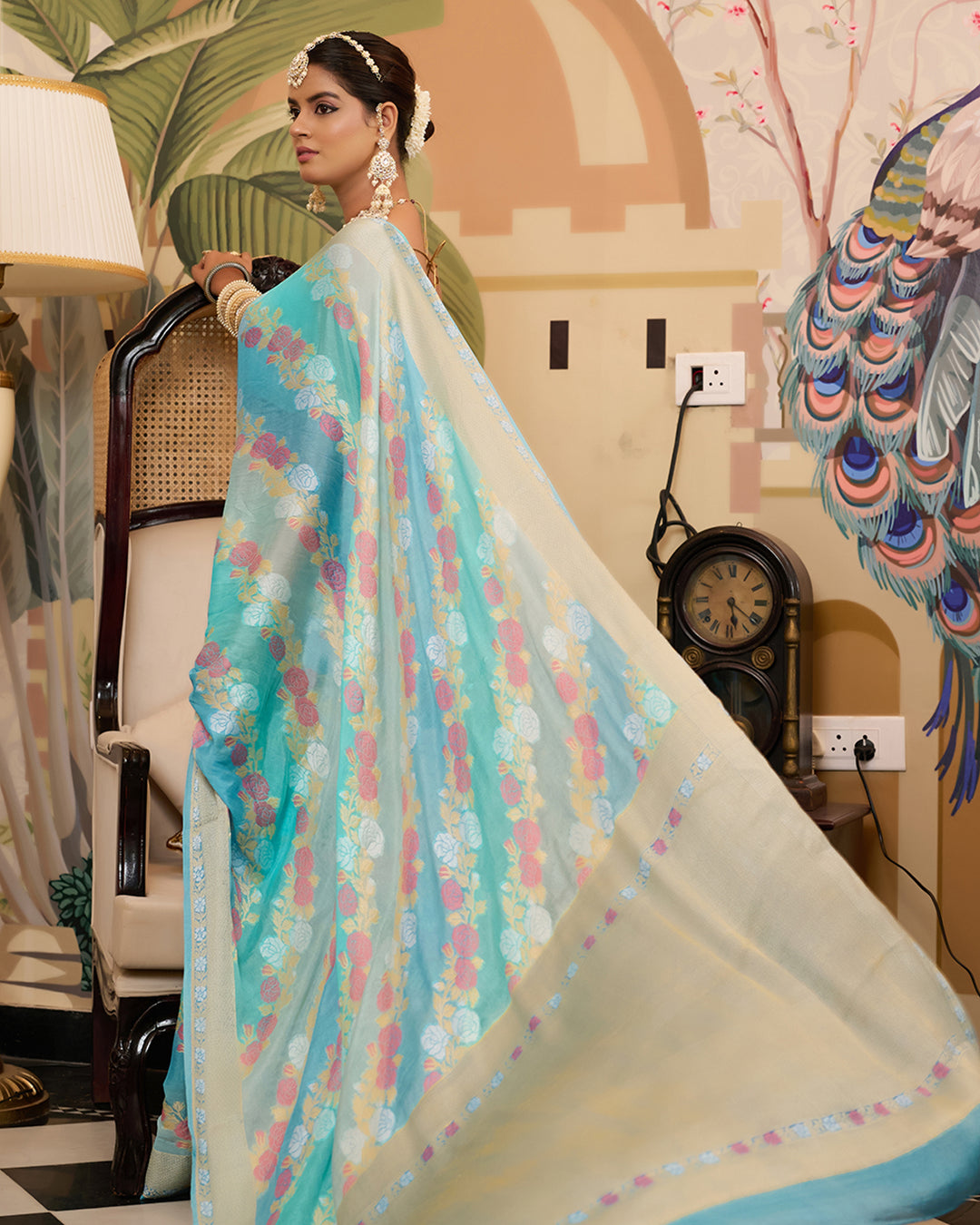 Aqua Blue Pure Chiffon Saree with Zari and Radiant Stripes Floral Detailing