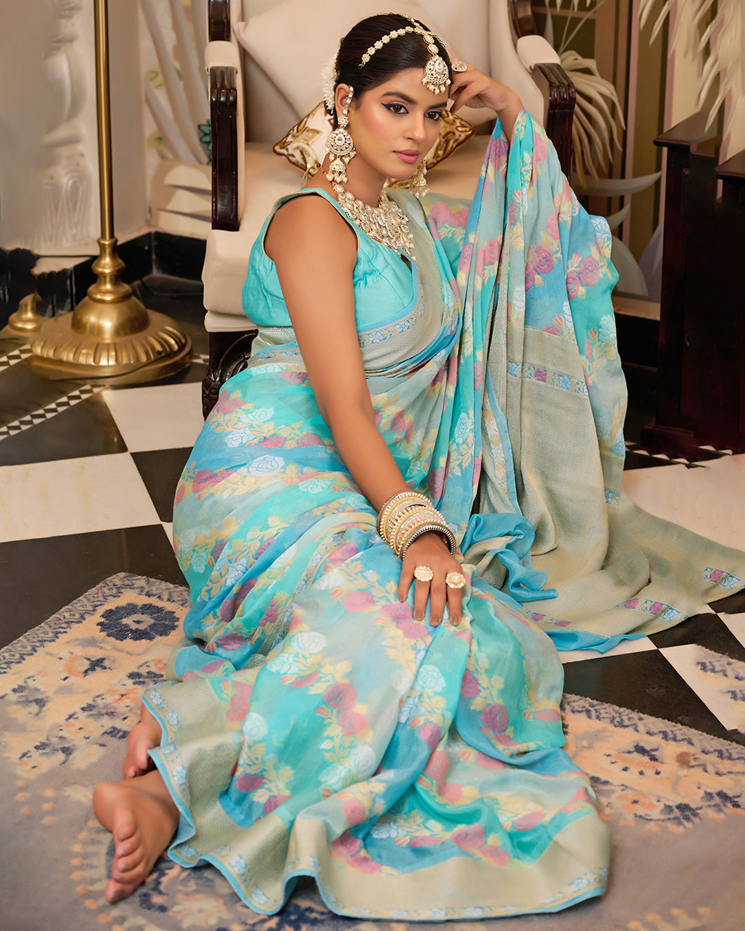 Aqua Blue Pure Chiffon Saree with Zari and Radiant Stripes Floral Detailing
