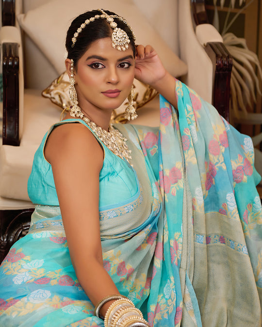 Aqua Blue Pure Chiffon Saree with Zari and Radiant Stripes Floral Detailing