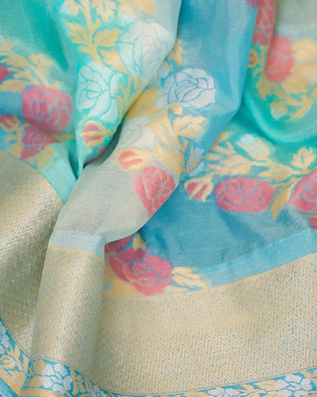 Aqua Blue Pure Chiffon Saree with Zari and Radiant Stripes Floral Detailing