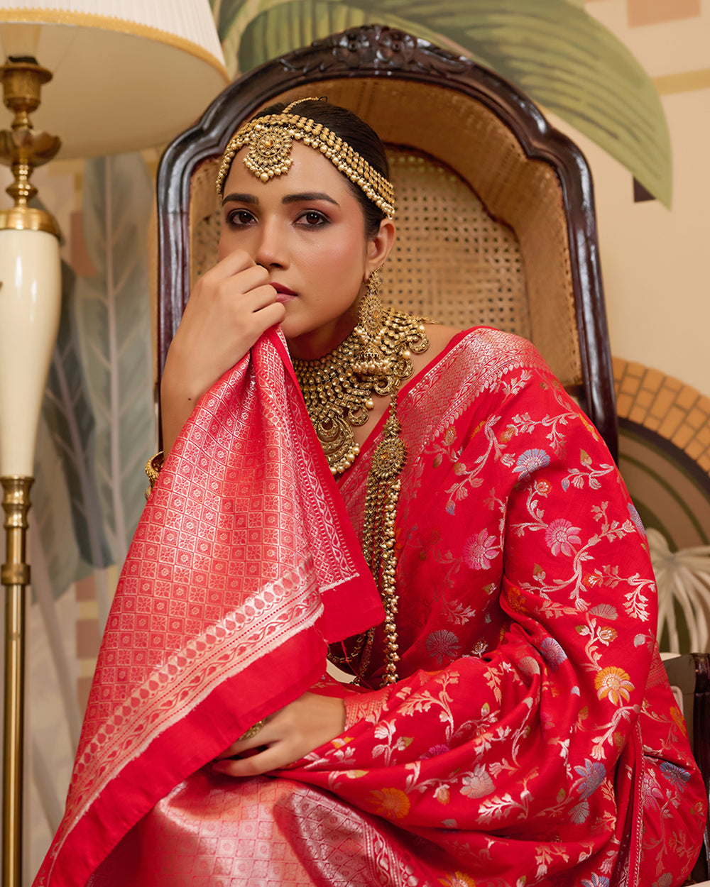 Red Pure Banarasi Saree with Zari Embellishments and Graceful Floral Motifs