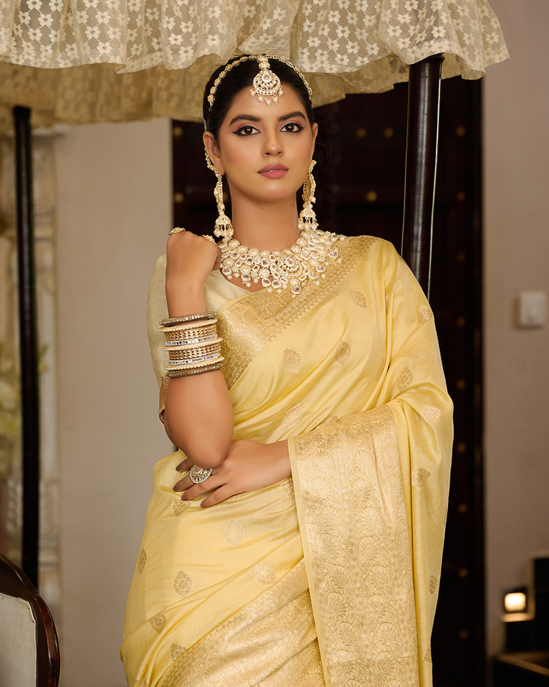 Pastel Yellow Pure Banarasi Saree with Elegant Zari and Buta Weaves