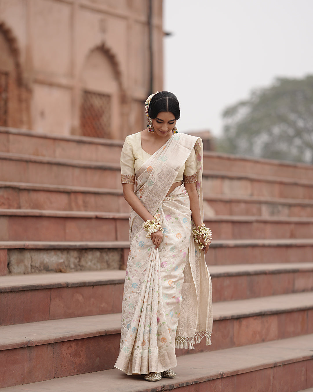 Ivory Pure Banarasi Saree with Pastel Florals Weaves and Subtle Zari Accents