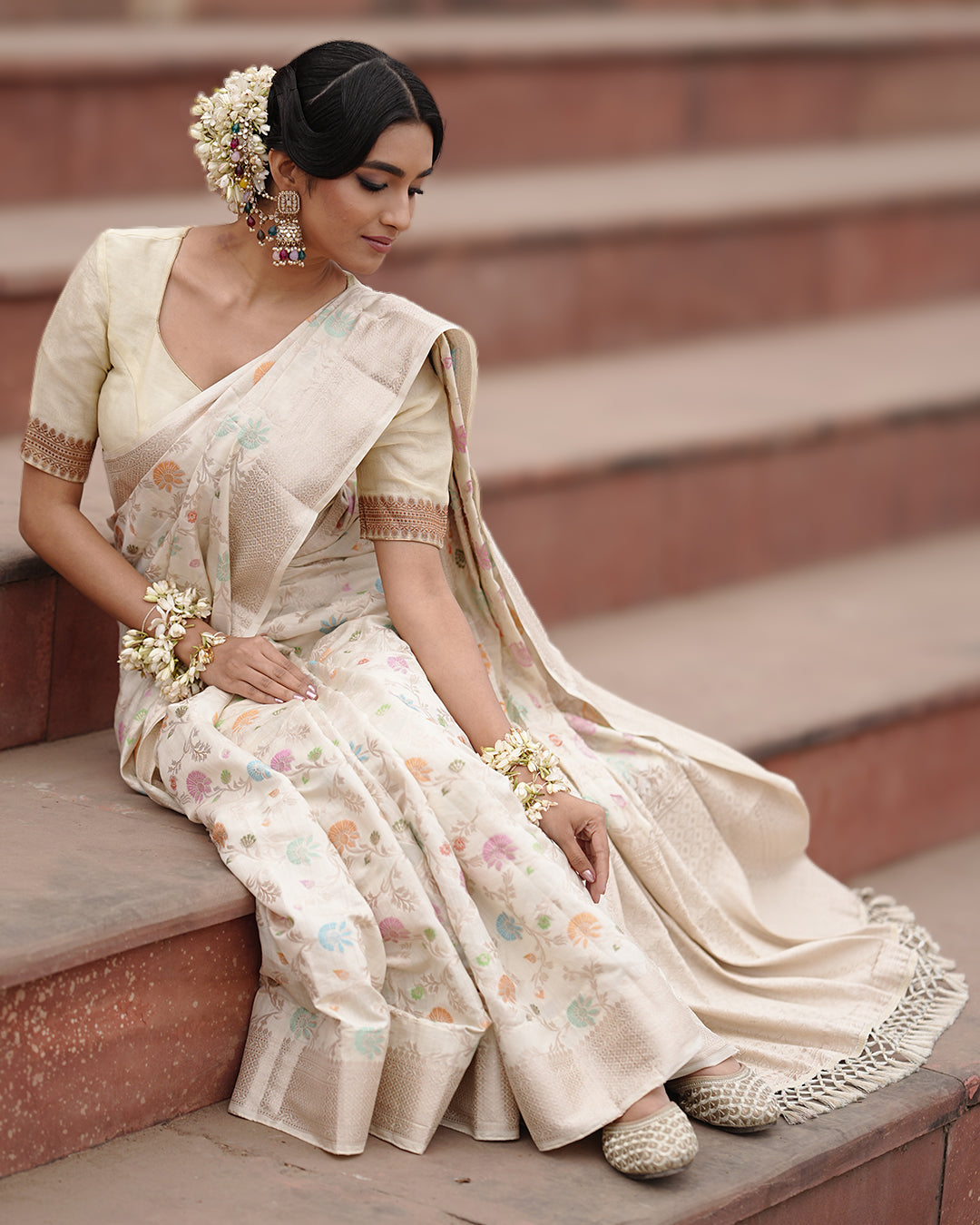 Ivory Pure Banarasi Saree with Pastel Florals Weaves and Subtle Zari Accents