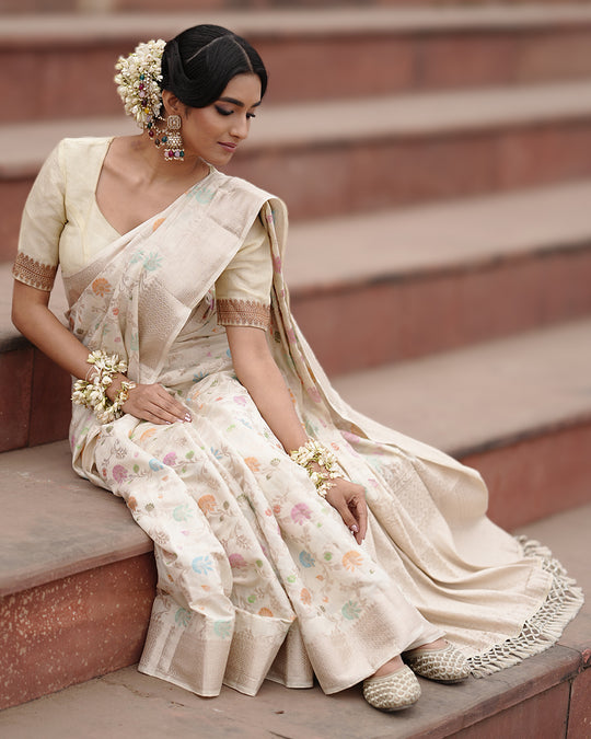 Ivory Pure Banarasi Saree with Pastel Florals Weaves and Subtle Zari Accents