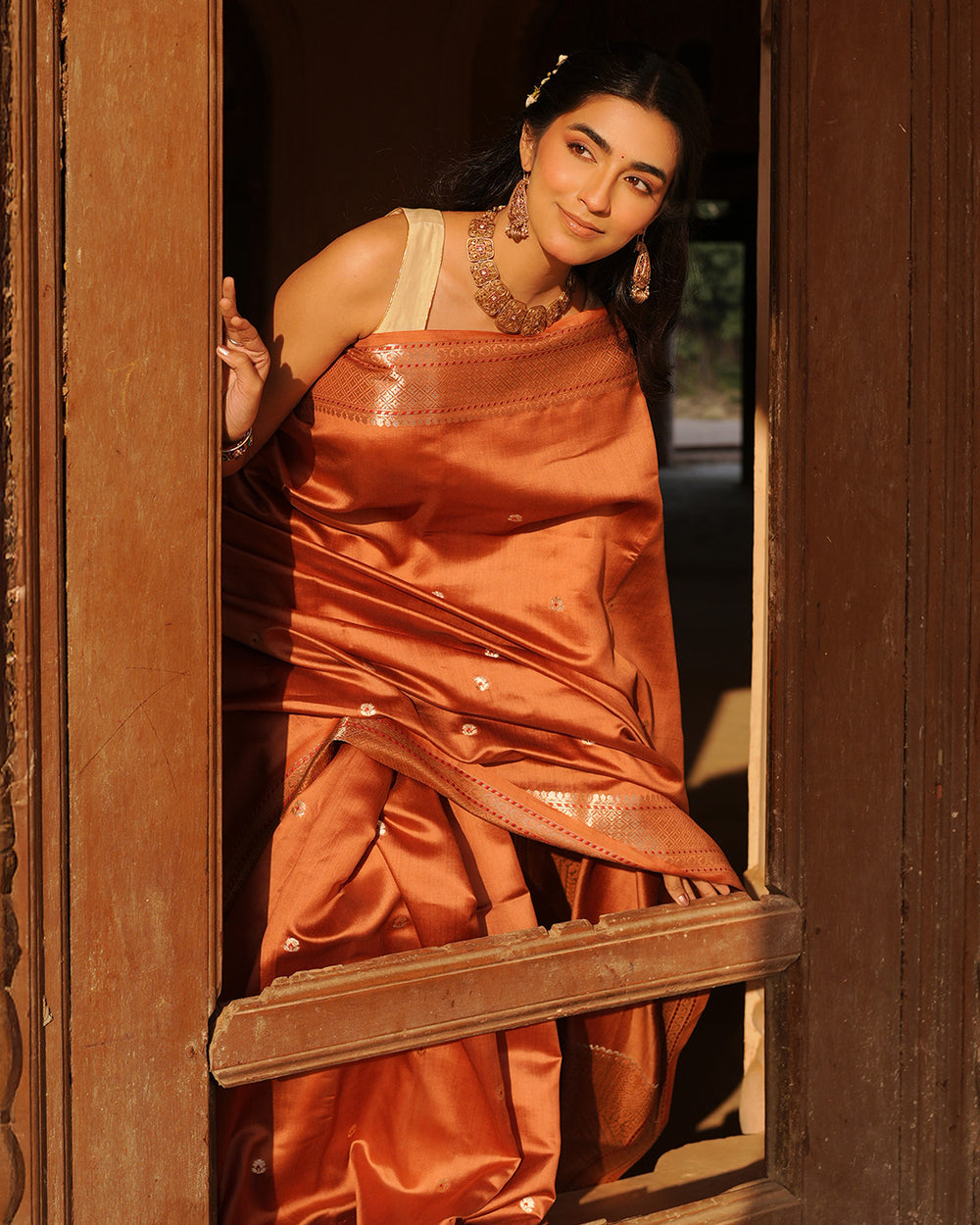 Terracotta Banarasi Silk Saree with Timeless Craft