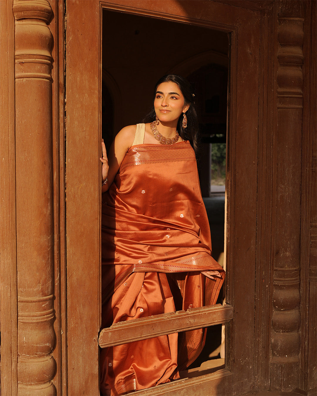 Terracotta Banarasi Silk Saree with Timeless Craft
