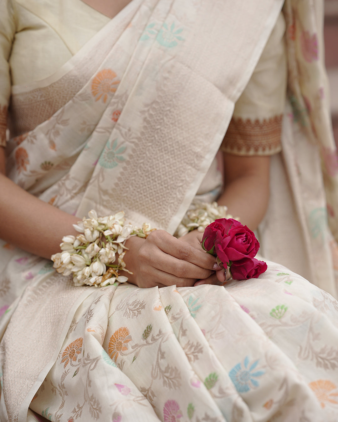 Ivory Pure Banarasi Saree with Pastel Florals Weaves and Subtle Zari Accents