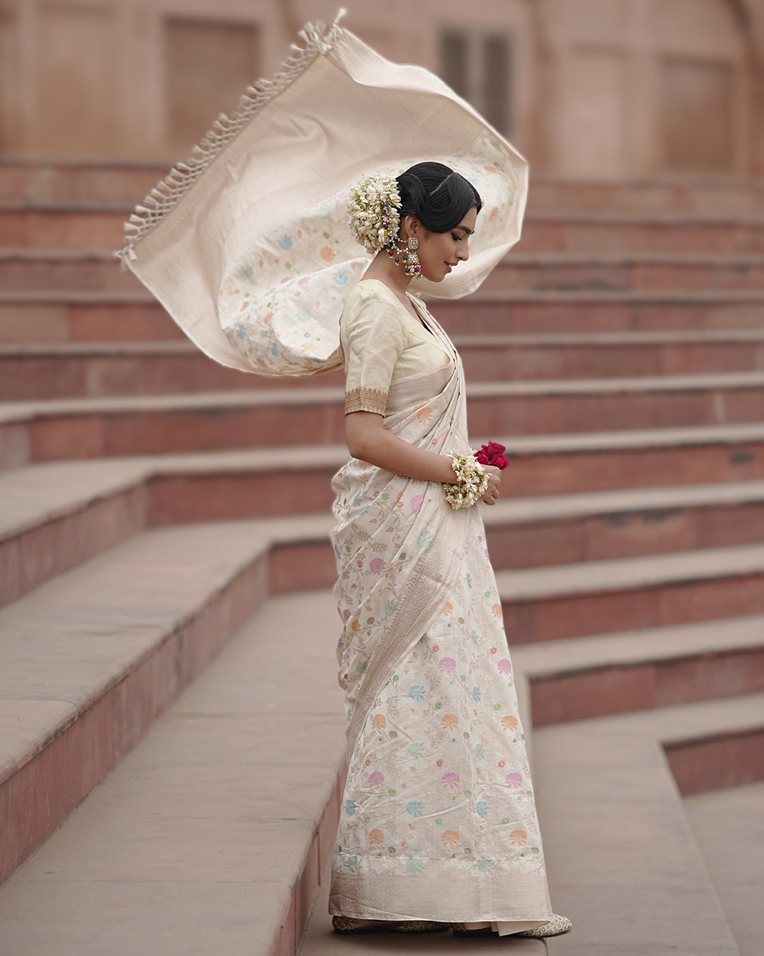 Ivory Pure Banarasi Saree with Pastel Florals Weaves and Subtle Zari Accents