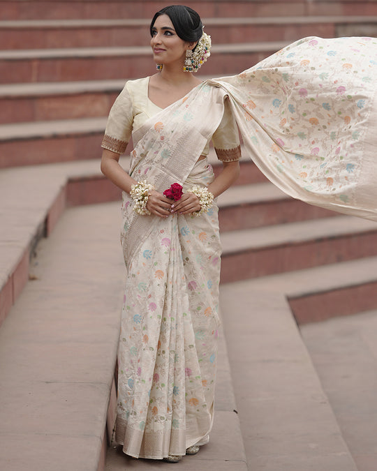 Ivory Pure Banarasi Saree with Pastel Florals Weaves and Subtle Zari Accents