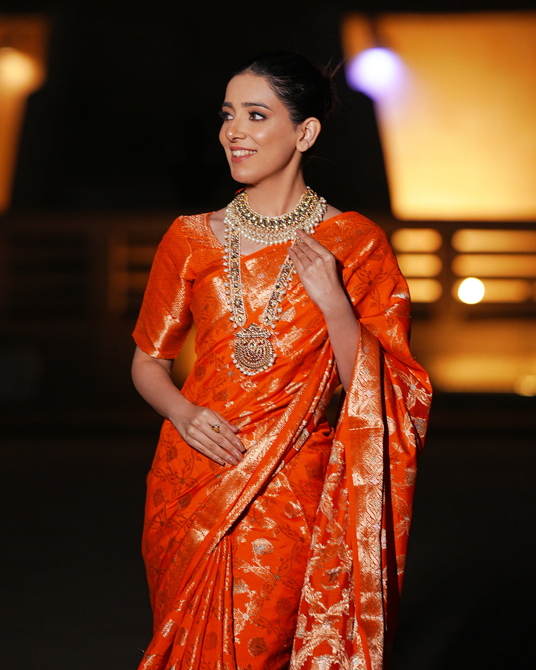 Vibrant Orange Pure Banarasi Silk Saree with Intricate Rich Golden Zari Work Embellishments