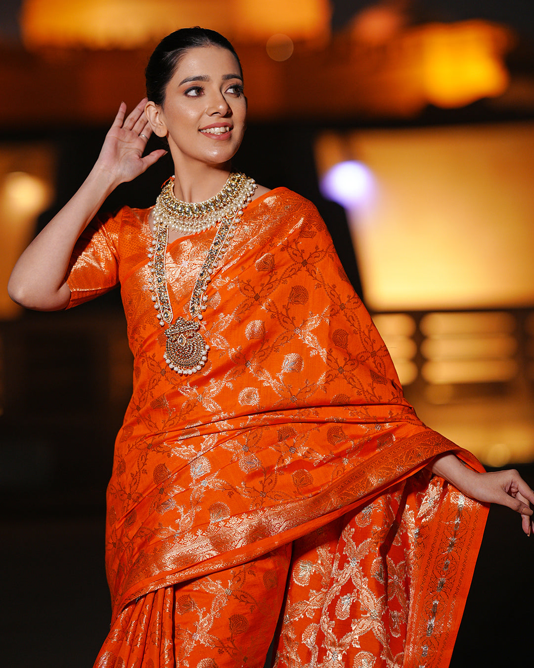 Vibrant Orange Pure Banarasi Silk Saree with Intricate Rich Golden Zari Work Embellishments