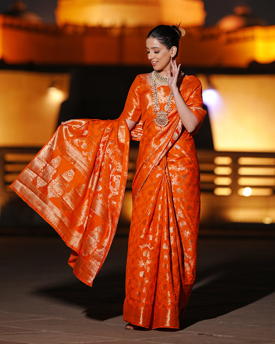 Vibrant Orange Pure Banarasi Silk Saree with Intricate Rich Golden Zari Work Embellishments