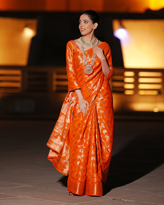 Vibrant Orange Pure Banarasi Silk Saree with Intricate Rich Golden Zari Work Embellishments