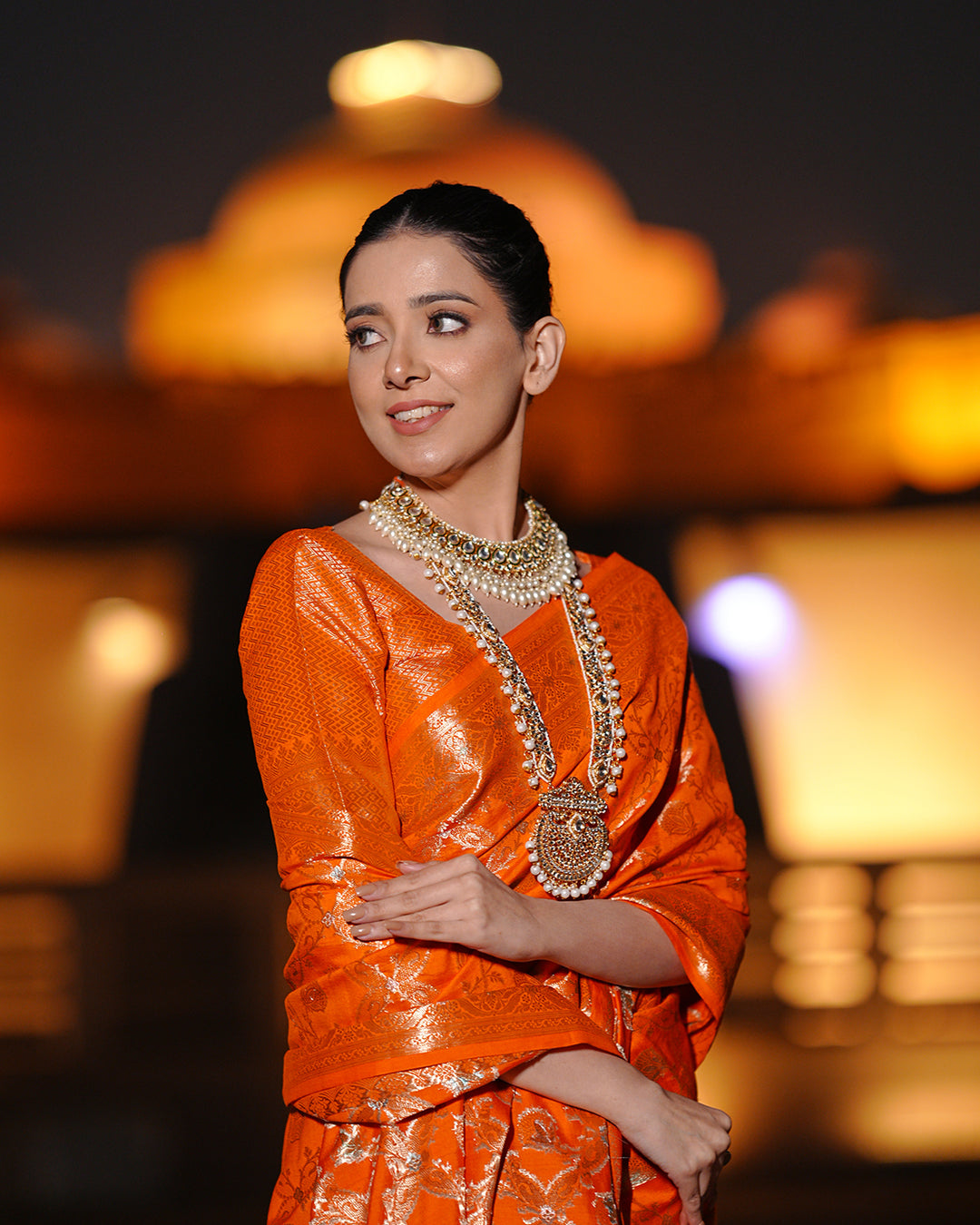 Vibrant Orange Pure Banarasi Silk Saree with Intricate Rich Golden Zari Work Embellishments