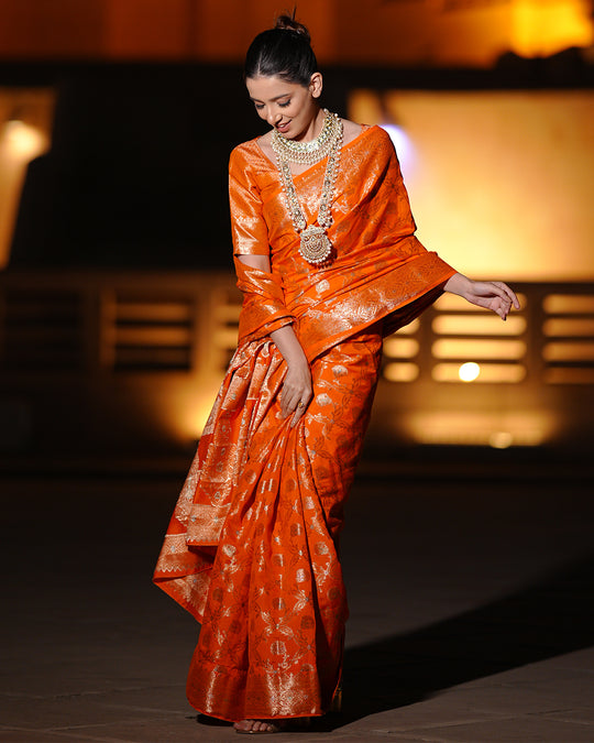 Vibrant Orange Pure Banarasi Silk Saree with Intricate Rich Golden Zari Work Embellishments