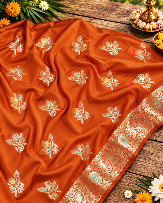 Terracotta Pure Banarasi Saree with Graceful Floral Butidar Weaves