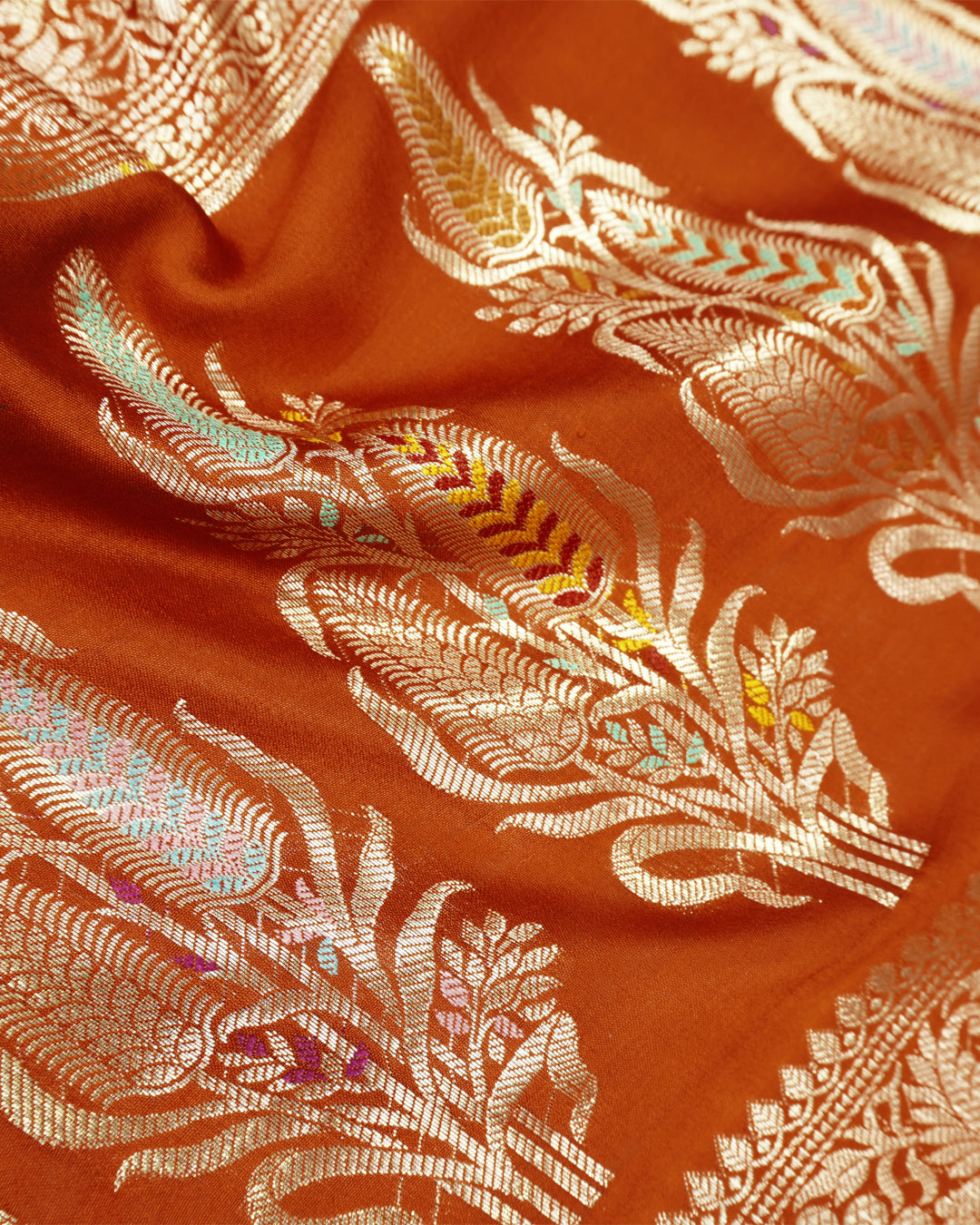 Terracotta Pure Banarasi Saree with Graceful Floral Butidar Weaves