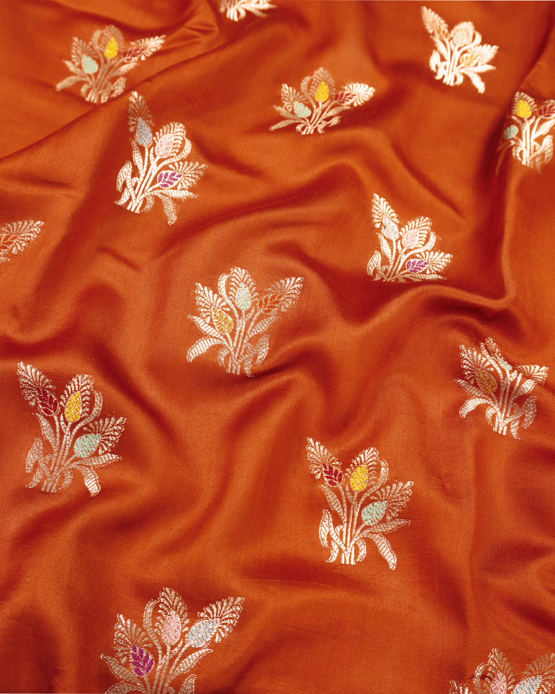 Terracotta Pure Banarasi Saree with Graceful Floral Butidar Weaves