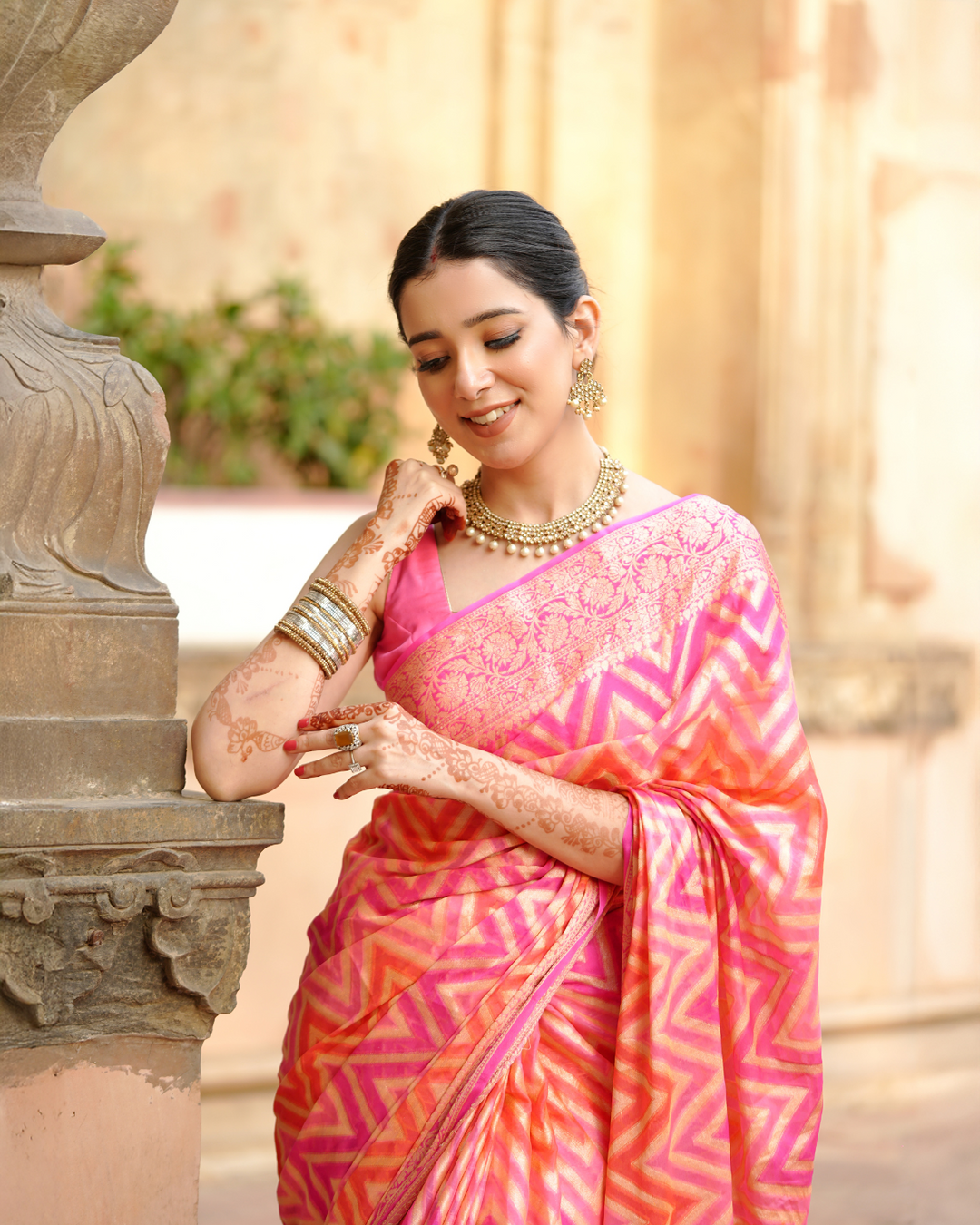 Sadabahaar Pure Chiffon Banarasi Silk Saree in Radiant Sunset Hues with Enchanting Chevron Weaves