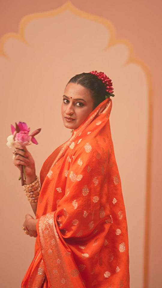 Orange Banarasi Saree with Delicate Floral Butta Weaves