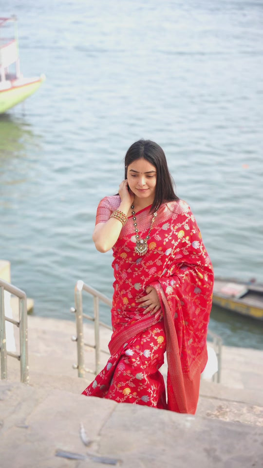 Radiant Red Banarasi Silk Saree with Opulent Real Zari Embellishments and Graceful Floral Motifs