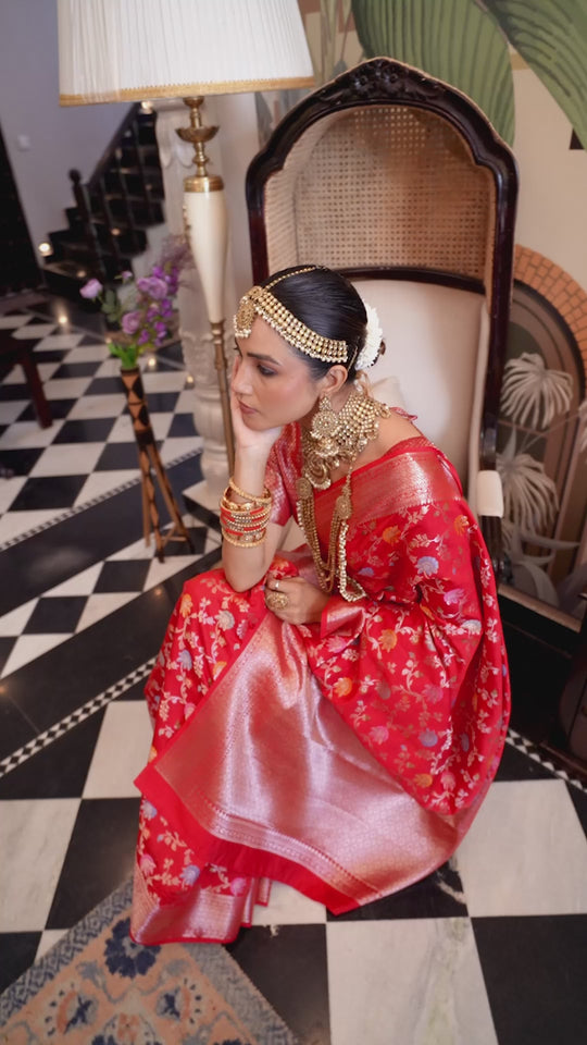 Red Pure Banarasi Saree with Zari Embellishments and Graceful Floral Motifs