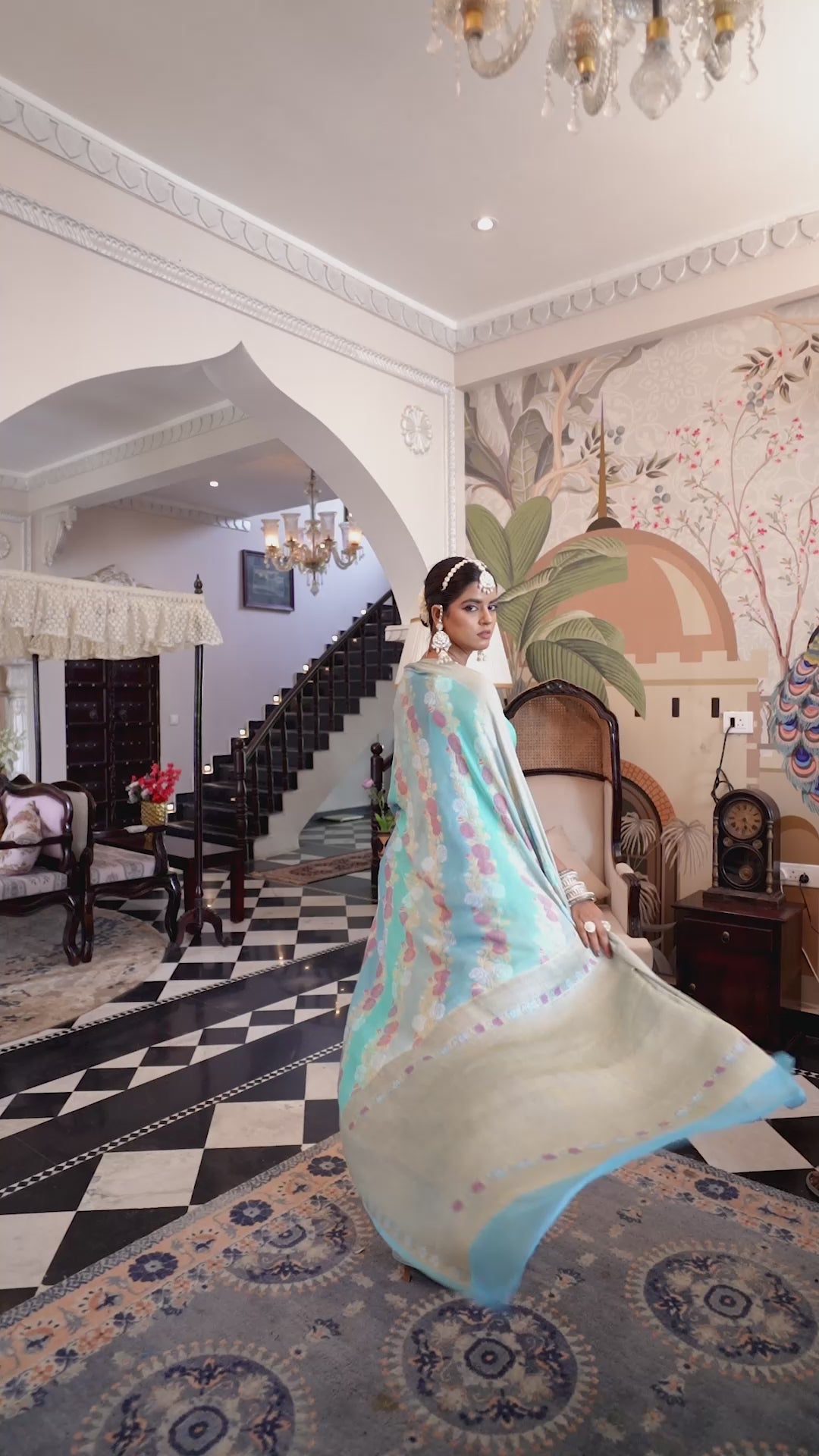 Aqua Blue Pure Chiffon Saree with Zari and Radiant Stripes Floral Detailing